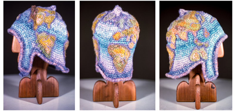 Elizabeth Tuttle, Atlas Helmet. Crocheted wool, wood. 15 x 10 x 7 inches.