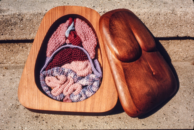 Elizabeth Tuttle, Body Box. Carved Redwood, Crocheted wool. 8 x 9 x 3.75 inches.