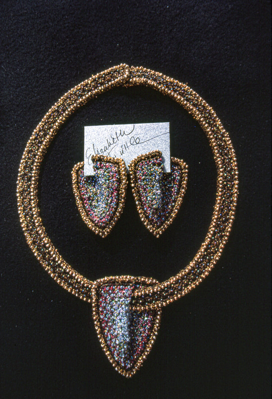 Elizabeth Tuttle, Shield Collar and Earrings. Crocheted cotton sewing thread Glass beads.