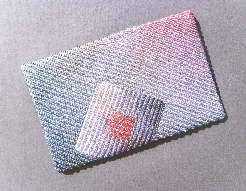 Elizabeth Tuttle, Floating Squares Envelope. Crocheted cotton sewing thread with glass beads and rayon ribbon. 5.5 x 8.5 inches. [Backside]