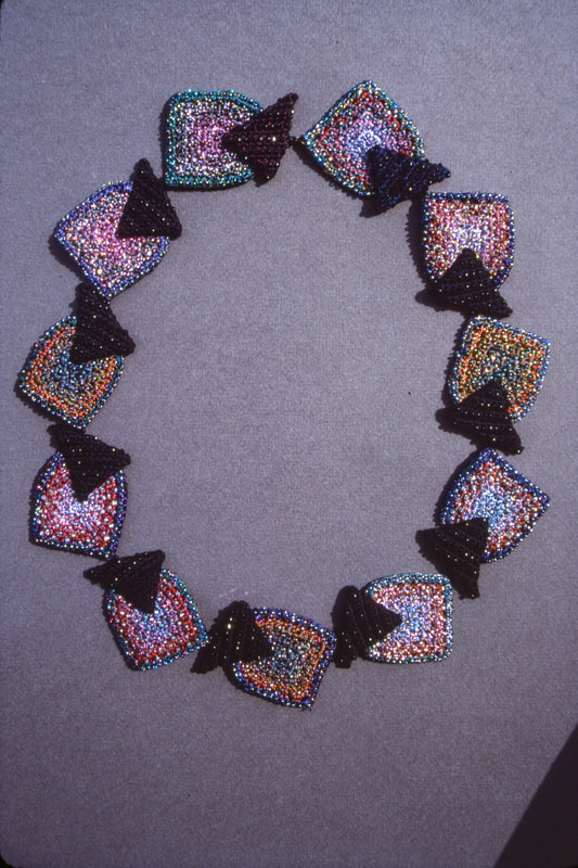 Elizabeth Tuttle, Shields and Triangle Collar. Crocheted cotton sewing thread with glass beads.
